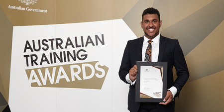 Tyrone with his Australian Training Awards finalist certificate